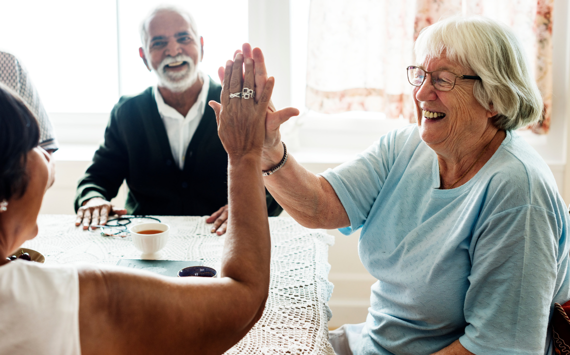 Elderly people high five